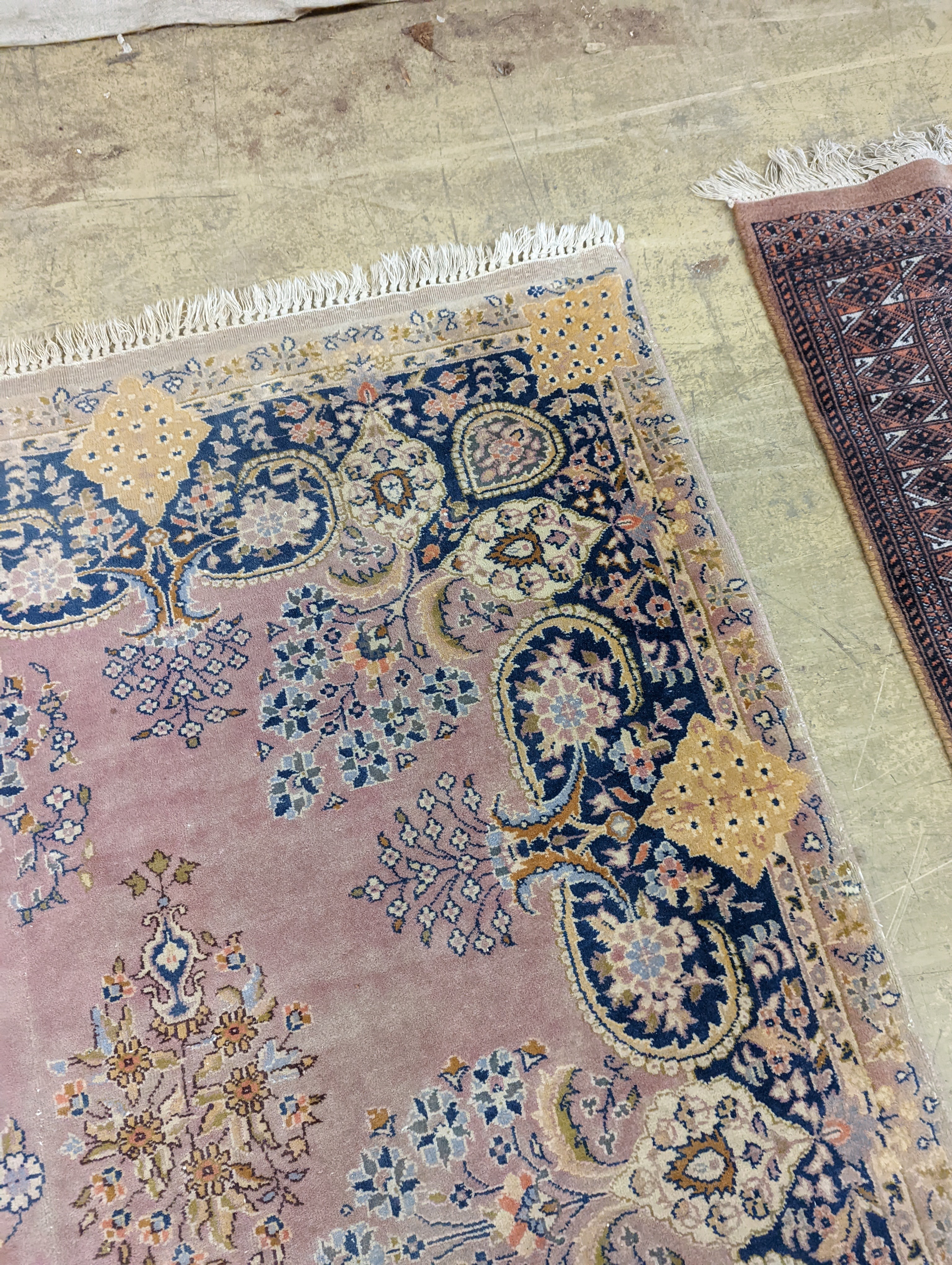 A North West Persian design peach ground carpet, 250 x 170cm